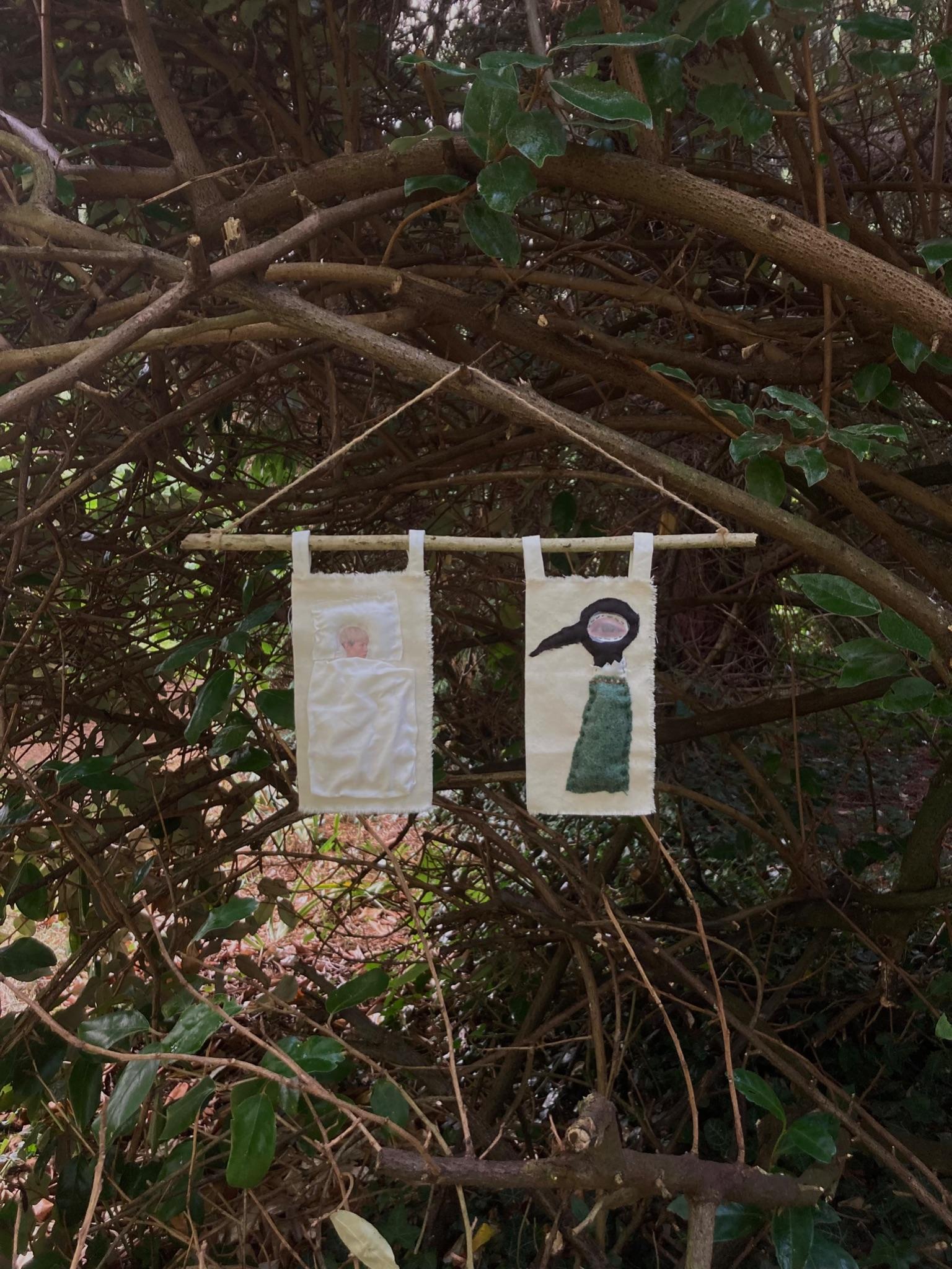 Flagpole piece installed outdoors in tree branches, close view